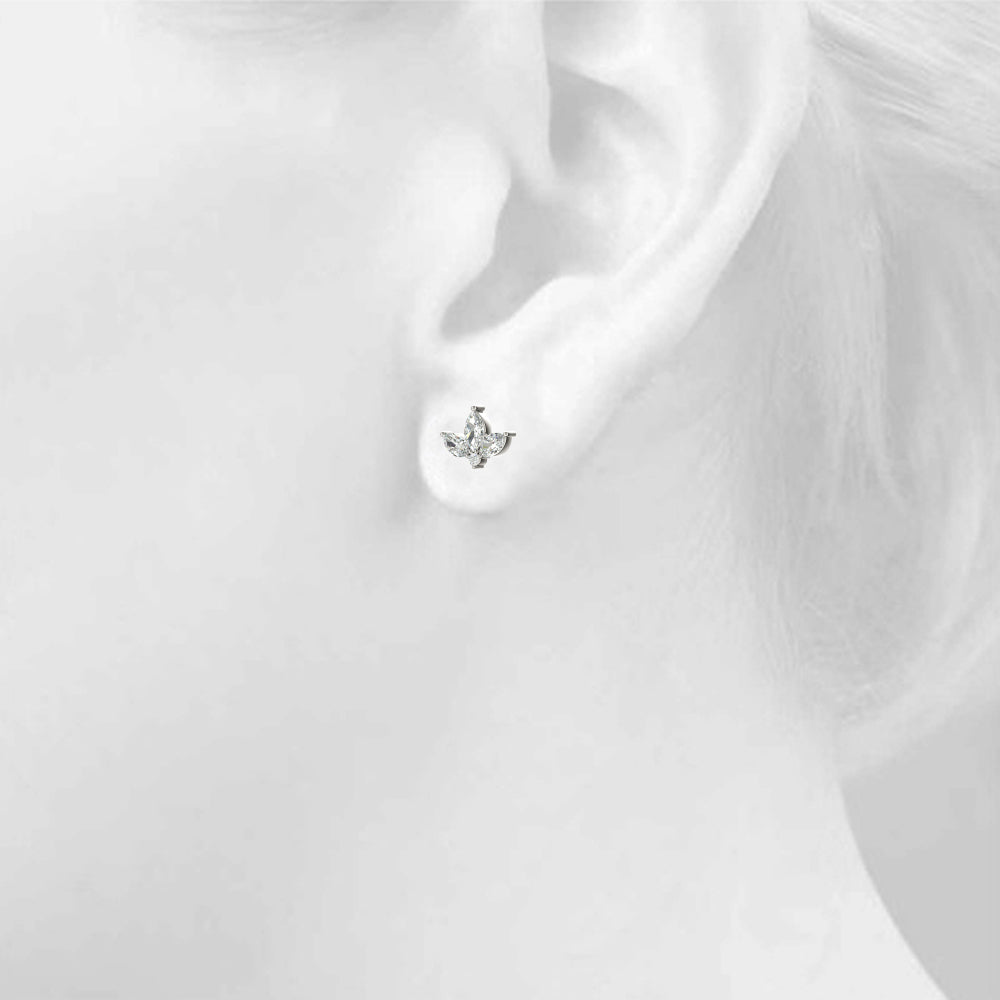 Floral cluster diamond stud earrings marquees
